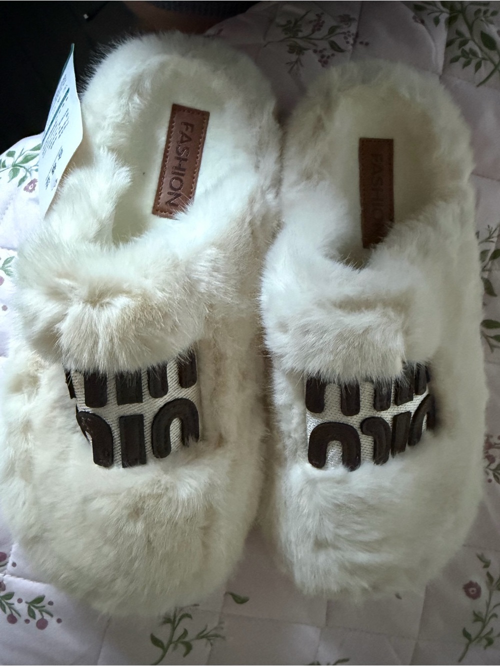 Faux Fur Slide Slippers in Cream - Label